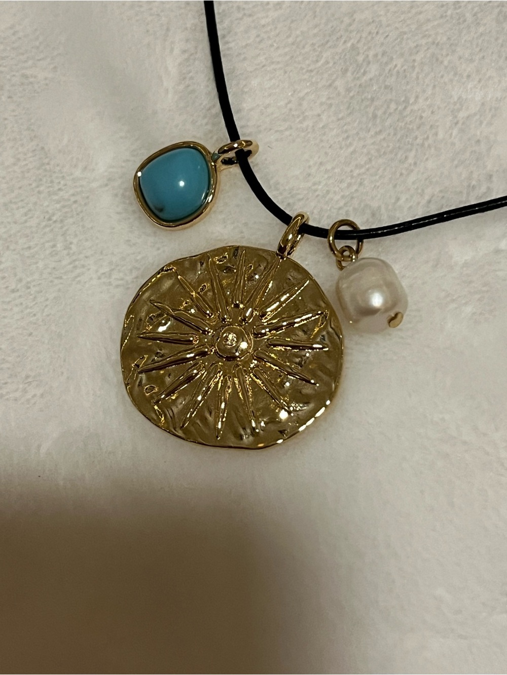 Marshalls Gold Sunburst Pendant Necklace with Turquoise and Pearl Charms
